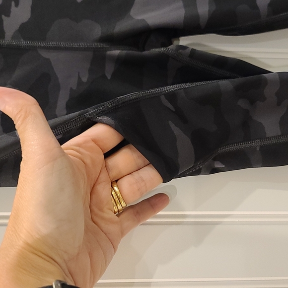 Practically brand new!  Athleta Ultimate 7/8 tights in black camo print. Size XS - Picture 7 of 9